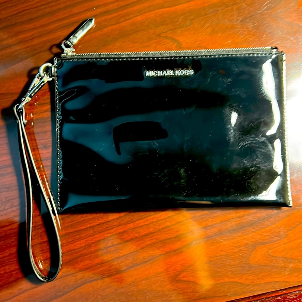 Michael Kors black cosmetic bag with silver accent 8”x5”